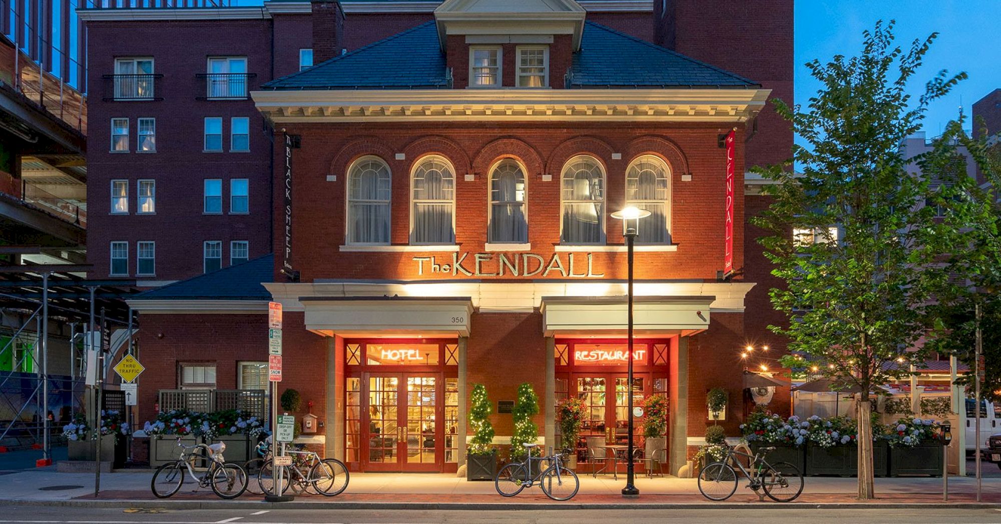 The image shows an illuminated storefront of 