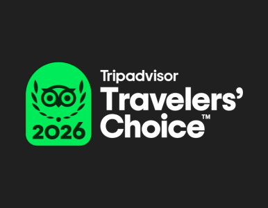 A green “Tripadvisor Travelers’ Choice 2026” award badge displayed on a dark background.